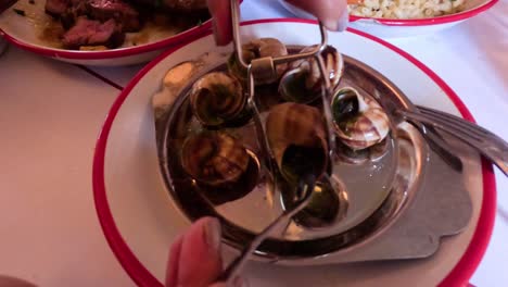 dining experience with escargot in paris, france