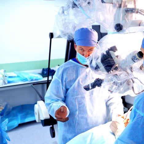 operation process in modern clinic. teamwork of surgeons performing surgery with medical equipment in the operating room. medical service.