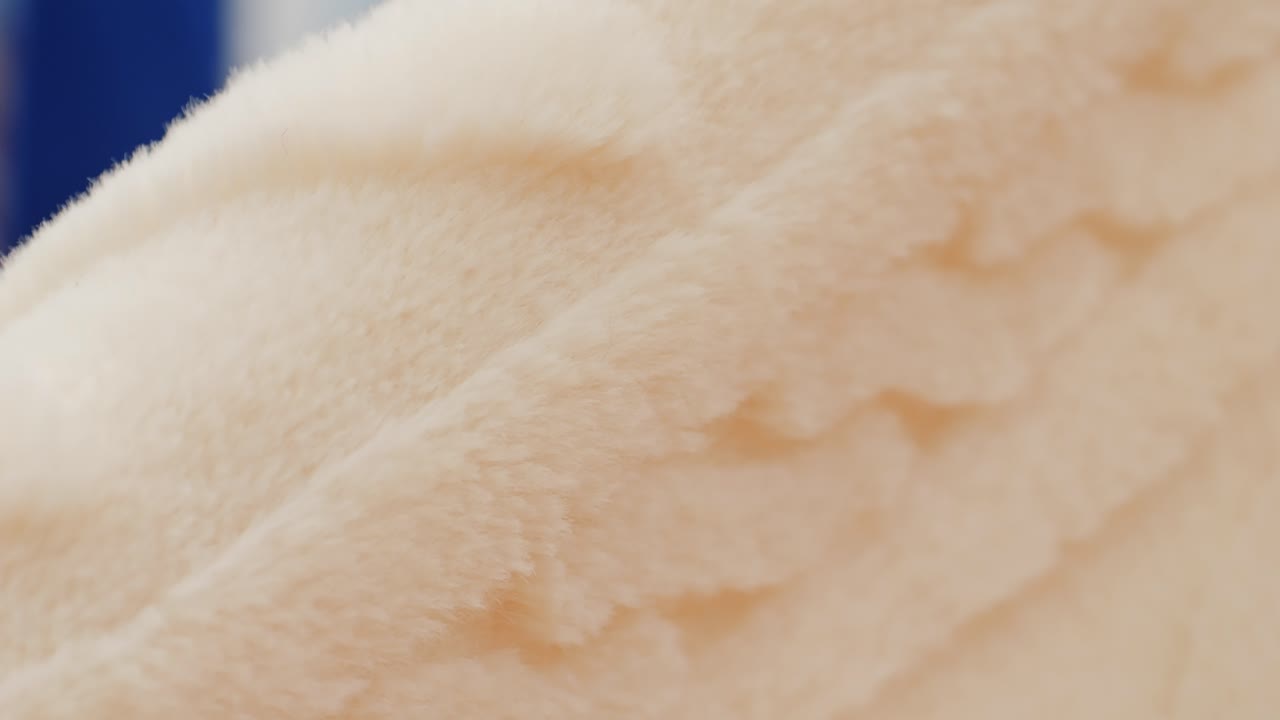 Detailed orange and white striped textured fabric, ideal for textiles and patterns. Perfect for apparel and crafts