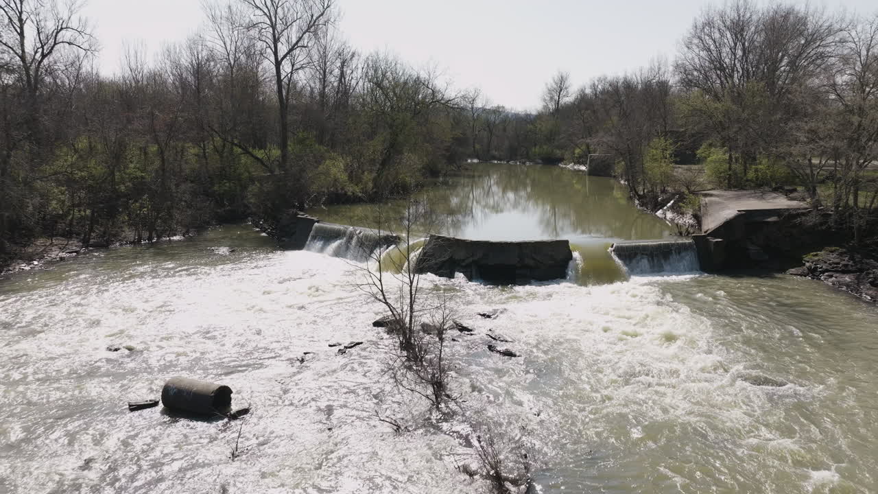 Slow motion shot of water going through the dam at West Fork River Pump Station
