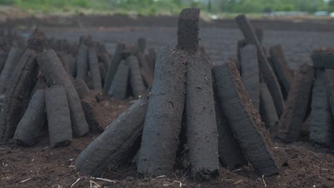 turf cut and stacked in irish bog drying