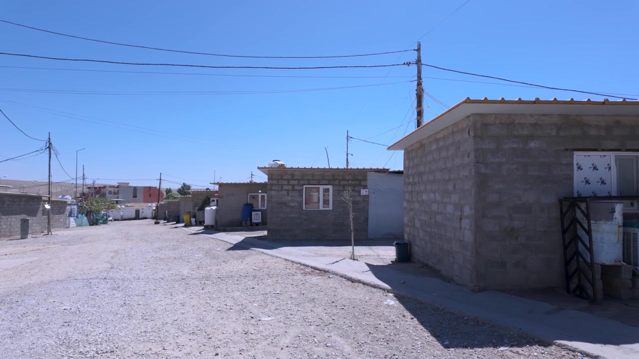 Sharya Refugee Camp cinder block shelters near Duhok, Kurdistan Iraq - panoramic street view