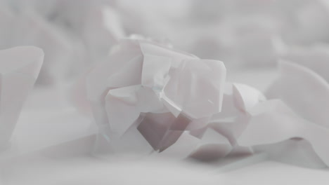 crushed android shells on spikes on a foggy, white junkyard