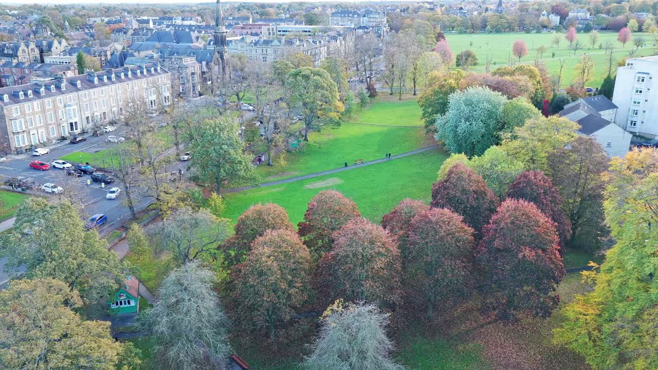 Aerial shot of Harrogate Centre’s green park, autumn trees and classic terraces beside Crescent Gardens, Yorkshire