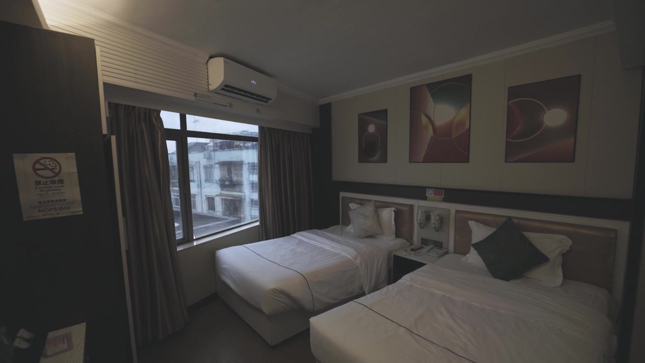 Camera d'albergo a Macao, camera doppia.