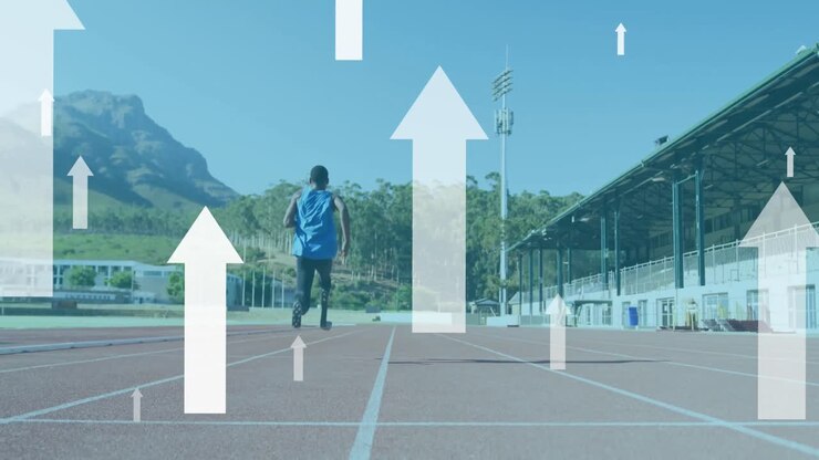 Animation of arrows pointing up over disabled male athlete with running blades on running track