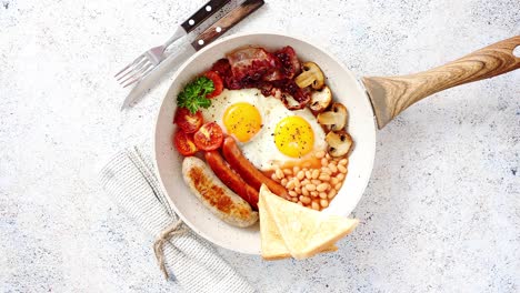 full english breakfast served in a pan