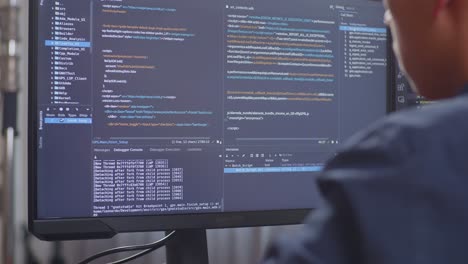 Person Coding on Computer