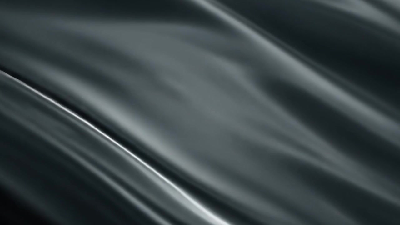 Abstract Flowing Dark Grey Silk Fabric Background