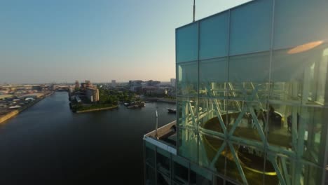 aerial view of modern cityscape with river and highrise building