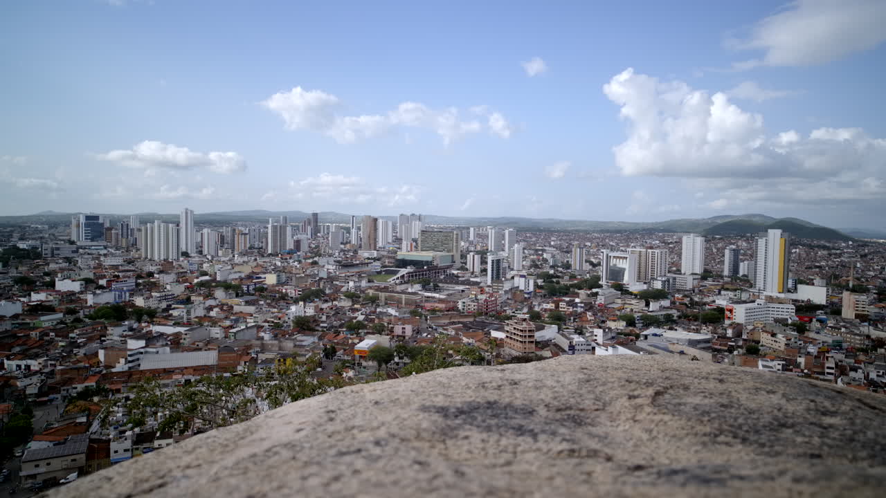 Landscape view of Caruaru city in Pernambuco Northeast Brazil from Monte Bom Jesus showing buildings streets and the urban spread of this regional center.