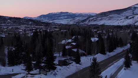 Small-settlement-with-houses,-Colorado-winter-scenery,-mountain-landscape