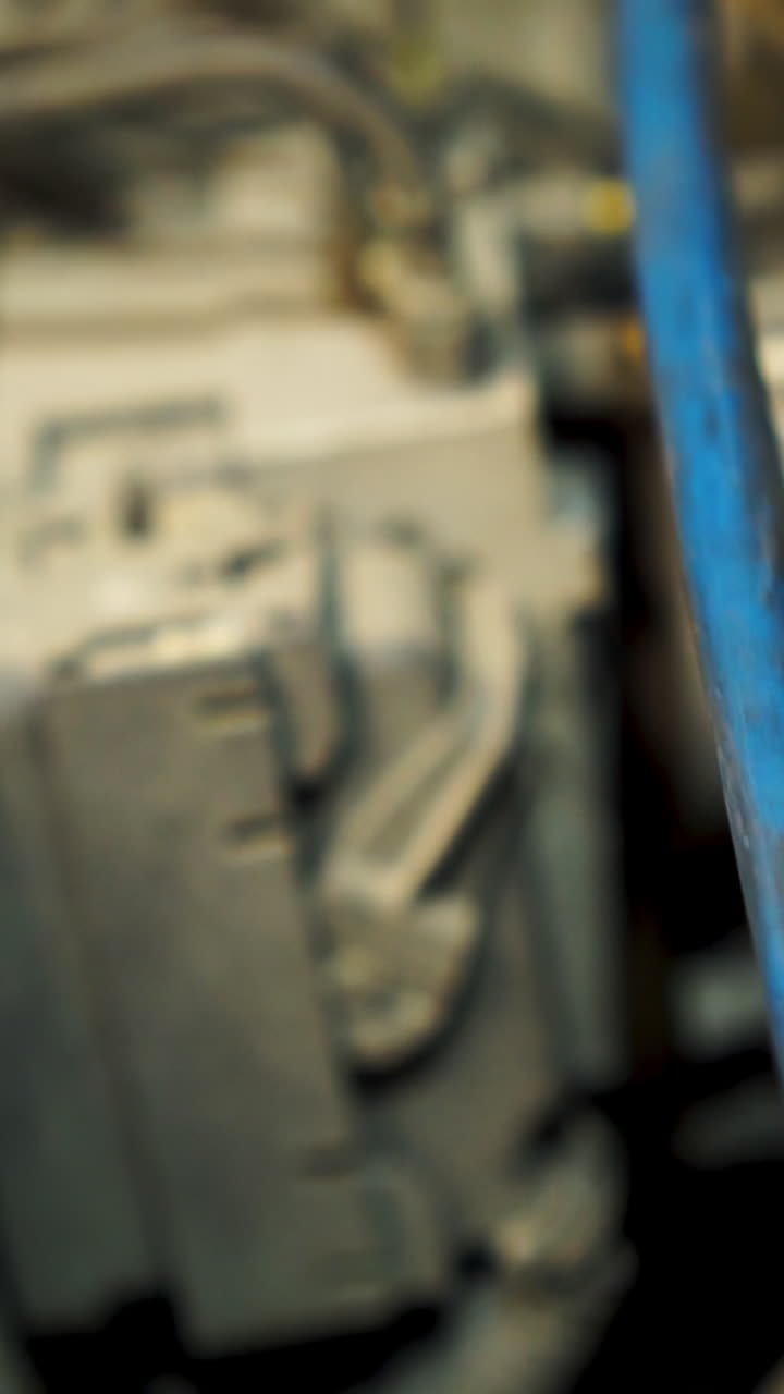 Close-up of car brake lines and components