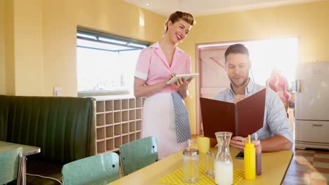 Waitress-taking-a-order-from-customer-4k