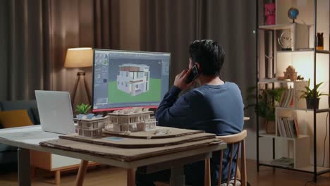 architect working on house design at night
