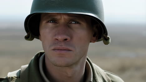 close-up portrait of a soldier in a helmet