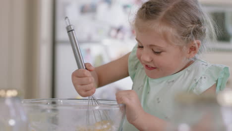 little girl helping mother bake in kitchen mixing ingredients baking cookies preparing recipe at home with mom teaching her daughter on weekend