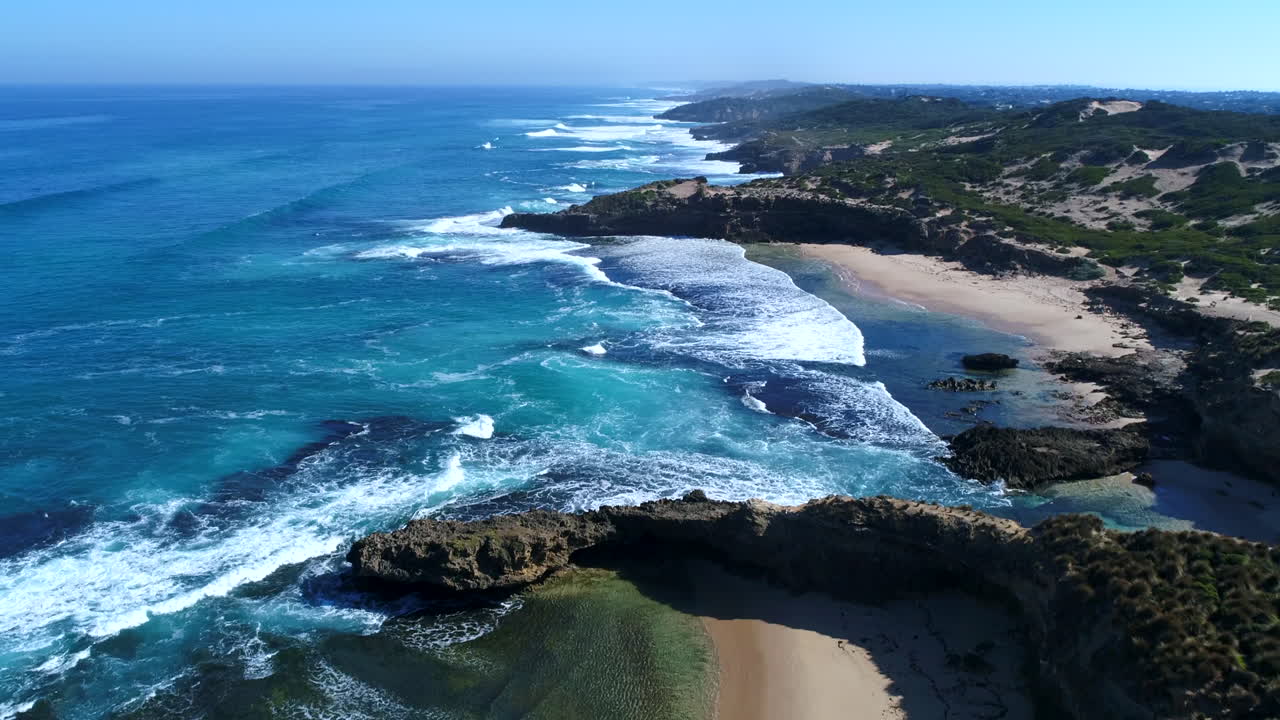 Aerial drone shots over an Australian beach with amazing views and great weather