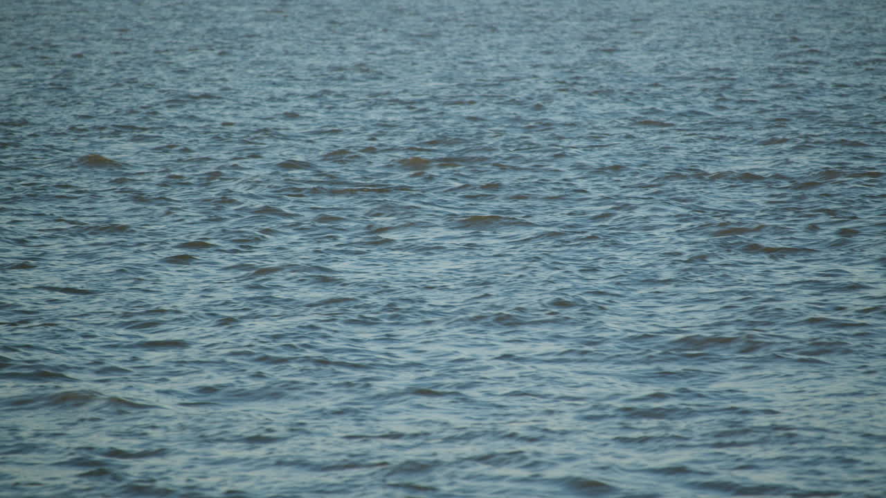 The sea shimmering in the late afternoon sun at Caister on Sea