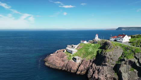 A-smooth-spin-around-a-lighthouse-and-World-War-2-ruins-to-reveal-the-eastern-most-point-of-North-America-and-the-city-behind