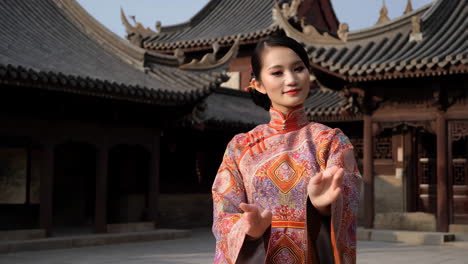 elegant woman in traditional chinese dress at a historic site