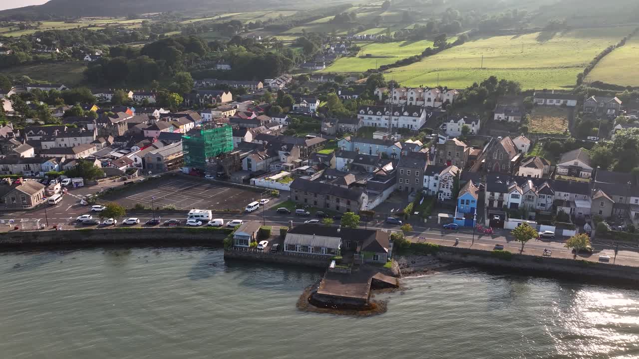 Carlingford charming town, seaside of Ireland. Road trip, promenade, morning light. Aerial