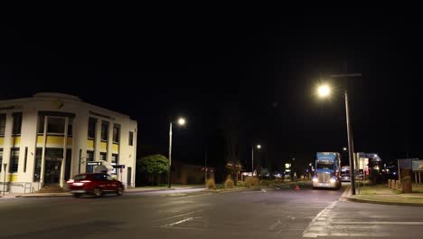 time-lapse of vehicles passing through a city junction