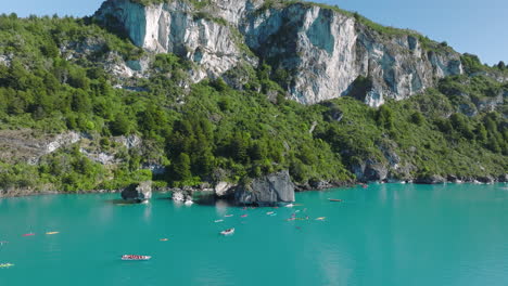 Kayakers-Exploring-Marble-Chapel-Caves-On-Lake-General-Carrera