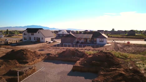 A-drone-shot-fast-pushing-in-on-a-recently-dug-hole-for-the-starting-of-a-new-home