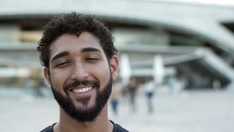 Closeup-shot-of-handsome-young-man-looking-at-camera