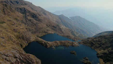 4k aerial drone footage over the 2nd and 3th lagoon of pichgacocha from ambo, huanuco, peru in the andes mountains
