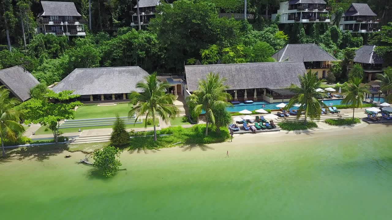 Aerial view of a luxury resort at Gaya Island,Kota Kinabulu,Malaysia.Medium shot pan right slowly and horizontally.