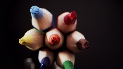 unique macro probe of colorful pencils details on black background