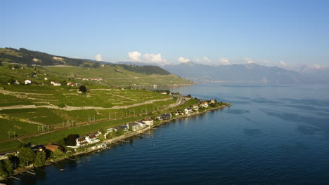 sunset view over cully village on lake geneva with lavaux vineyard in the canton of vaud in switzerland at summer