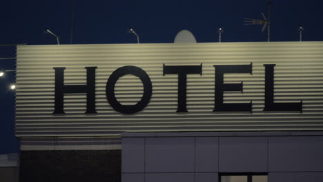 night view of hotel banner in the street