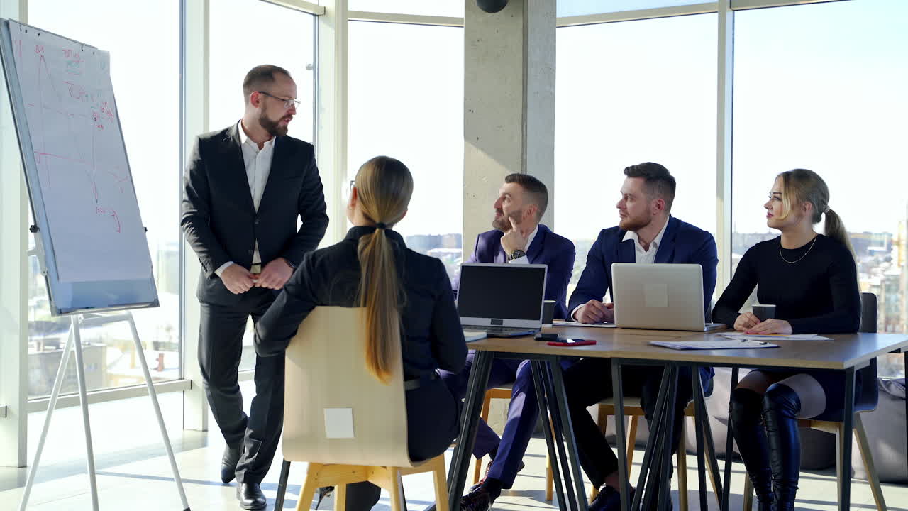 Modern office meeting with businessmen. Team courses in office.