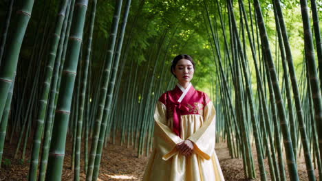 woman in hanbok in a bamboo forest
