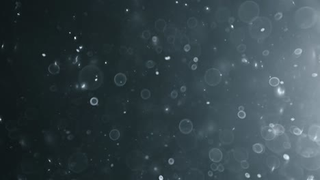 bokeh de partículas abstractas flotantes sobre fondo oscuro