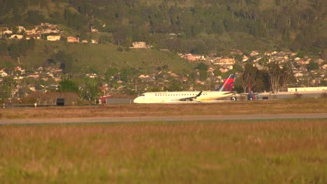 cargo airplane landing on busy runway