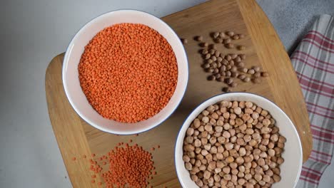 turkish chickpeas and red lentils. high protein legumes,beans and lentils for vegetarians.circular rotation on the table.