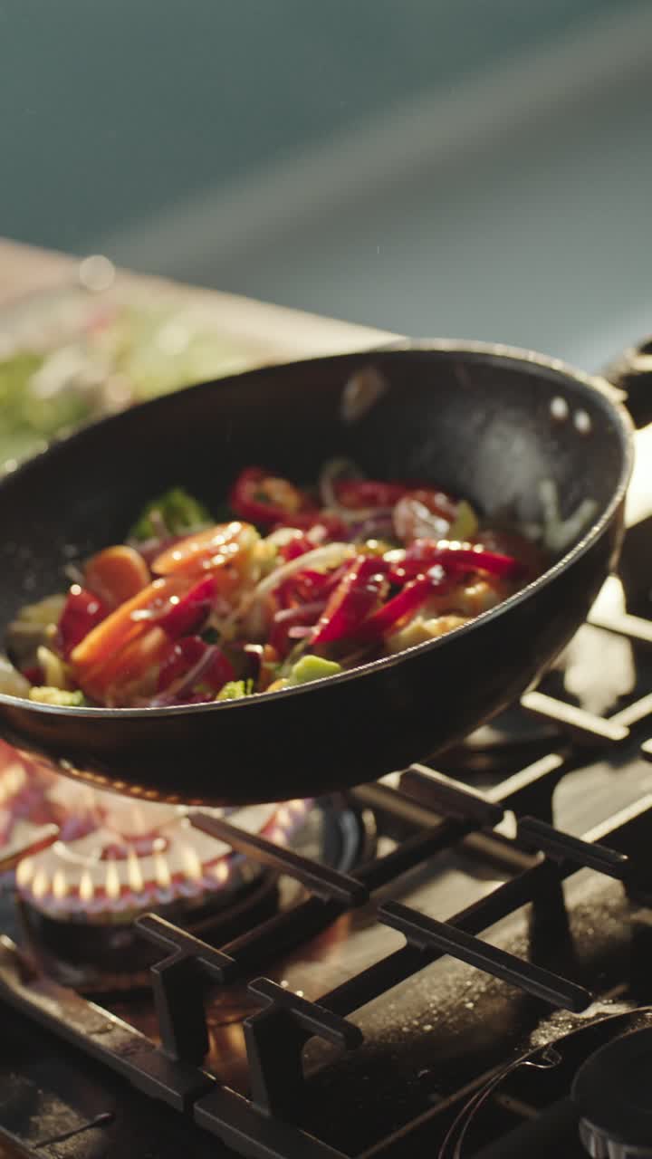 Cooking Vegetables in a Pan on a Gas Stove
