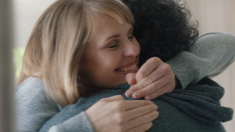 happy couple hugging excited woman embracing boyfriend sharing good news enjoying romantic relationship at home 4k footage