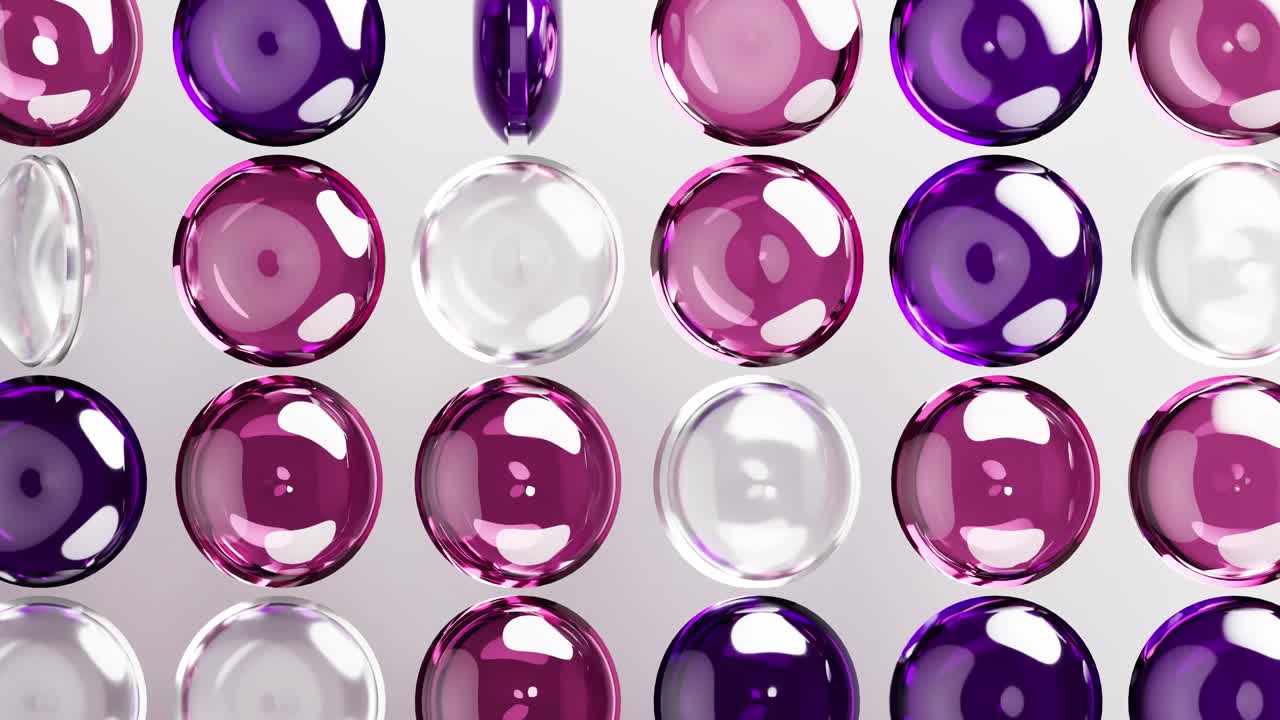 Loop continuo di sfere lucide rotanti in viola e rosa