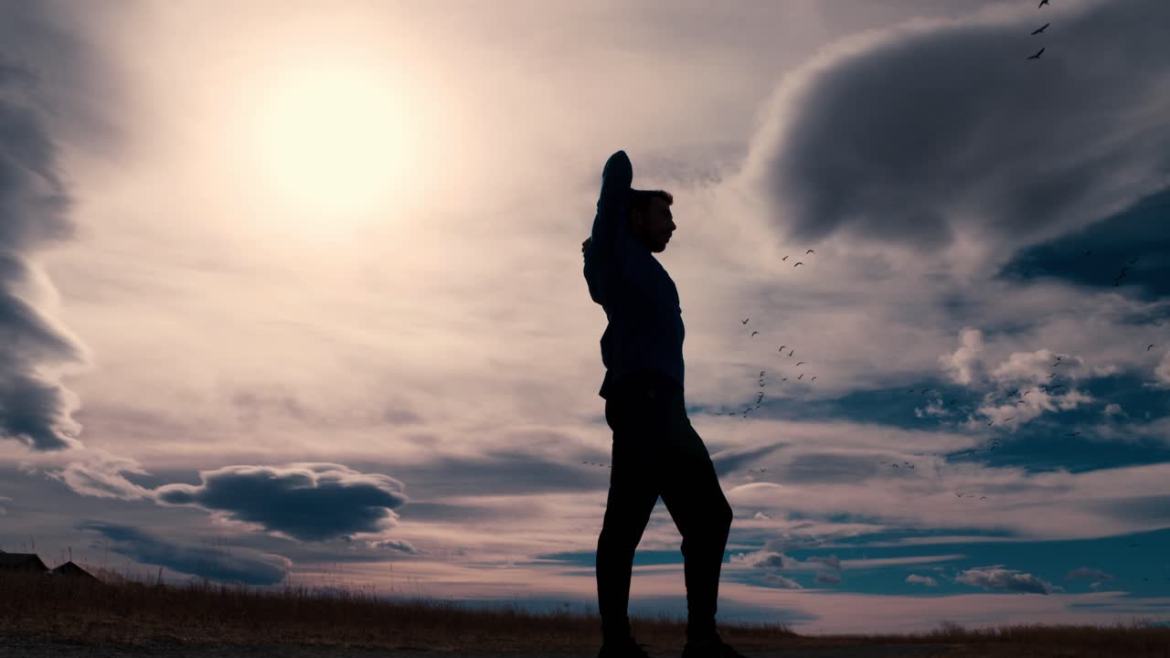 달리기 전에 팔을 뻗는 남성 조깅하는 사람의 눈에 띄는 검은 실루엣 윤곽