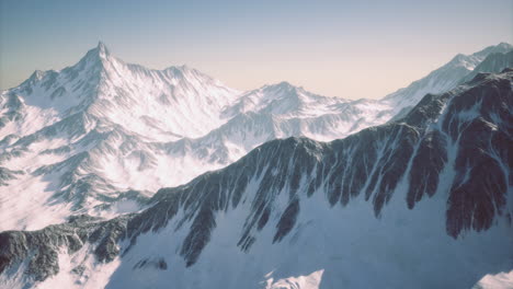 majestic snowy mountain range under clear sky during daytime