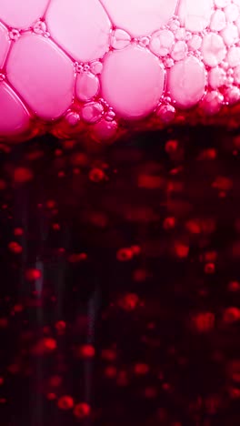a vibrant red liquid with dry ice creates bubbling effects, showcasing a dynamic science experiment with vivid colors and textures