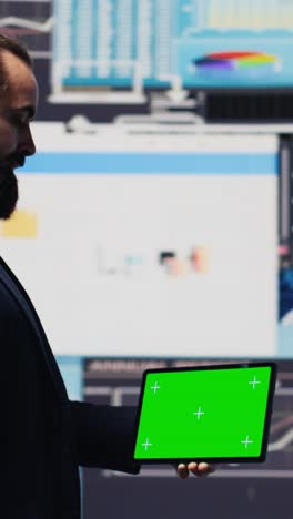 vertical video male administrator uses green screen phone to explore new growth strategy