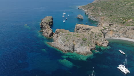 4k aerial orbit of beautiful in junco cove beach, panarea, italy