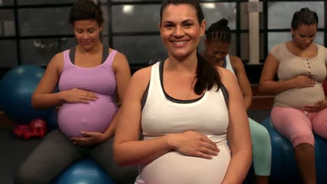 Pregnant-women-sitting-on-exercise-balls