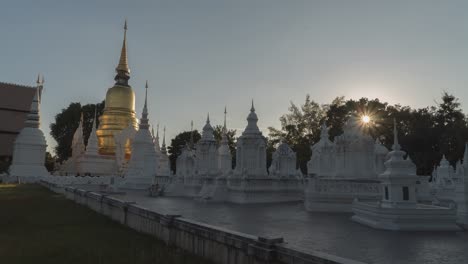 white and golden temples in thailand